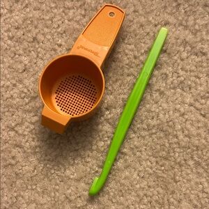 Vintage authentic Tupperware Orange Tea Strainer and Green Hook tool
